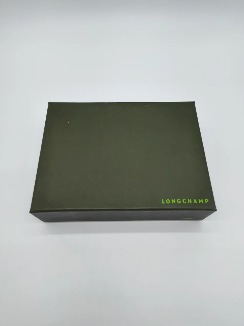Longchamp includes signature